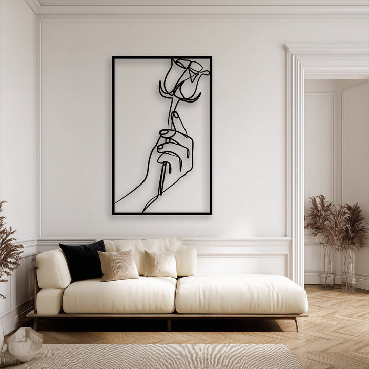 The visual rhythm of this elegant minimalist hand holding a rose line art decoration wall art provides a harmonious flow.