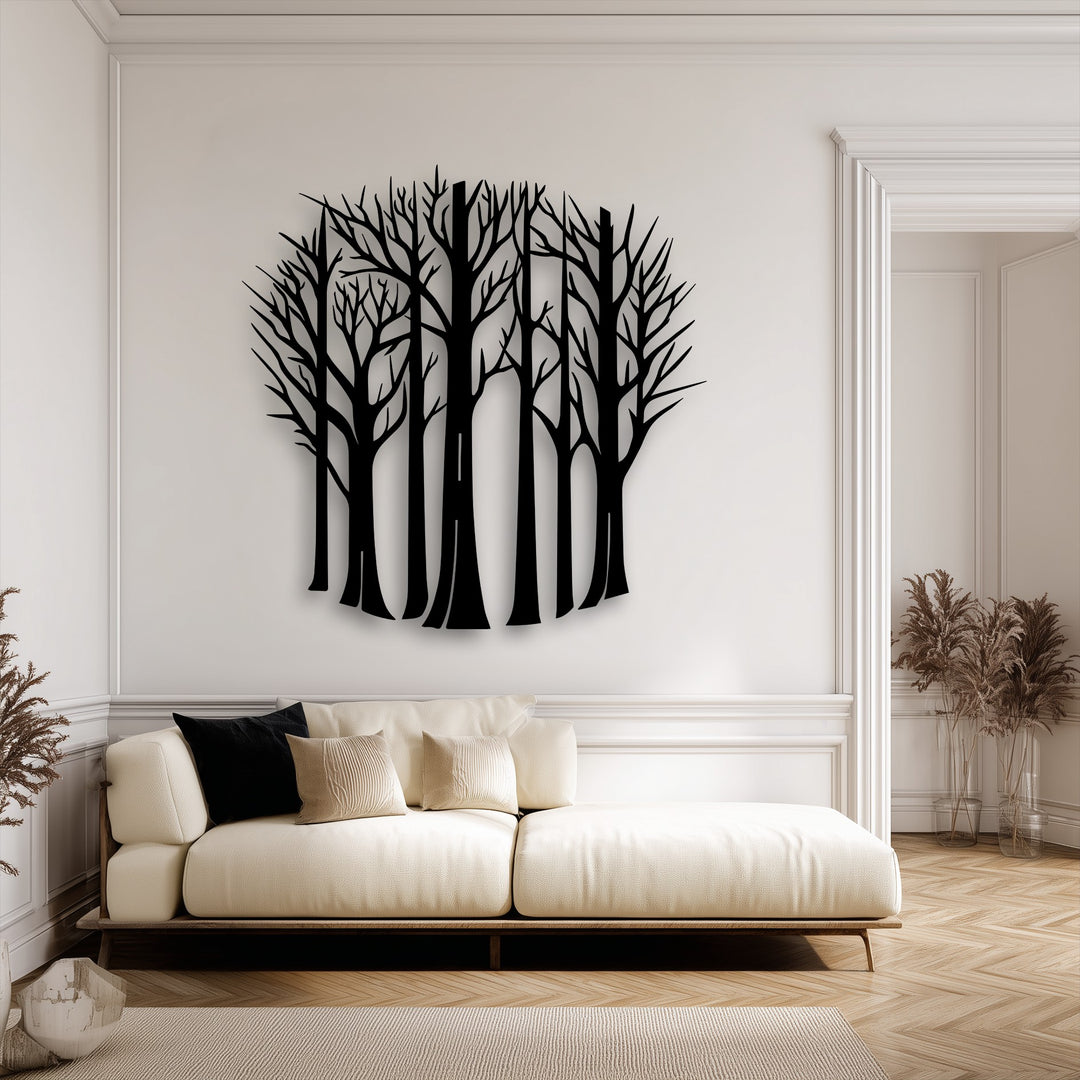A captivating silhouette of bare forest trees crafted as decorative metal art, forming a striking minimalist nature design.
