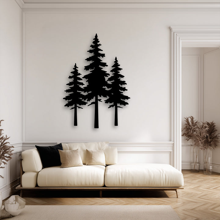 The visual rhythm of three varying height pine forest silhouette unique metal wall art pieces creates a dynamic contrast on the light wall.