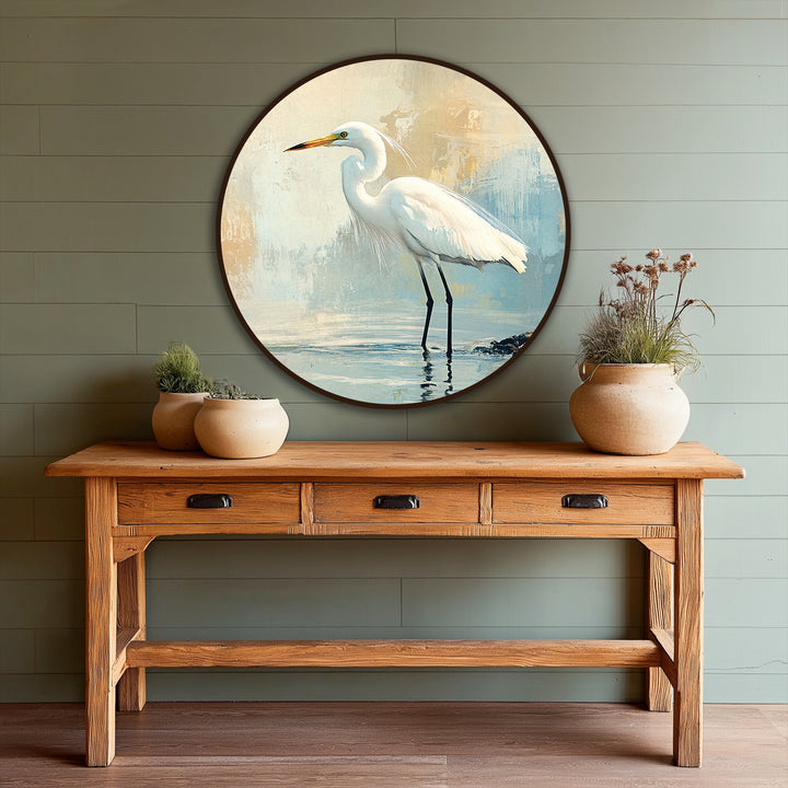 Dominant in soft blues and yellows, this oil painting reproduction print captures a white egret in coastal tones, a serene scene enhanced by the round canvas.