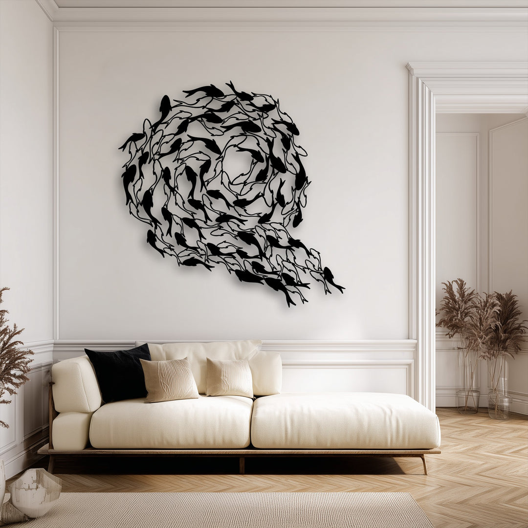 The darkest area, an intricate black koi fish circle metal wall decor, beautifully flows into a striking pattern on the bright wall.