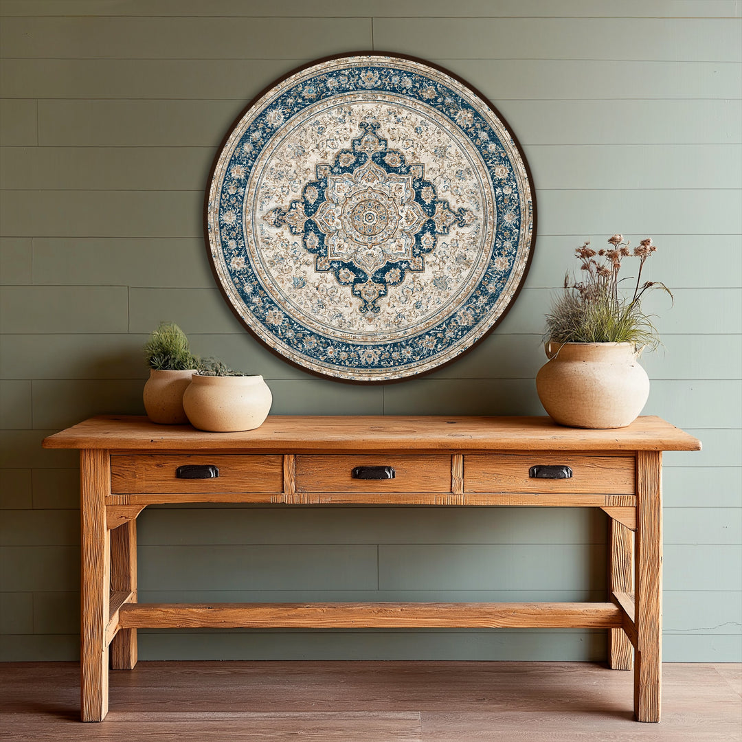 With layers of design, this round Persian-inspired oil painting wall art showcases depth through its ornate mandala pattern in navy and ivory.