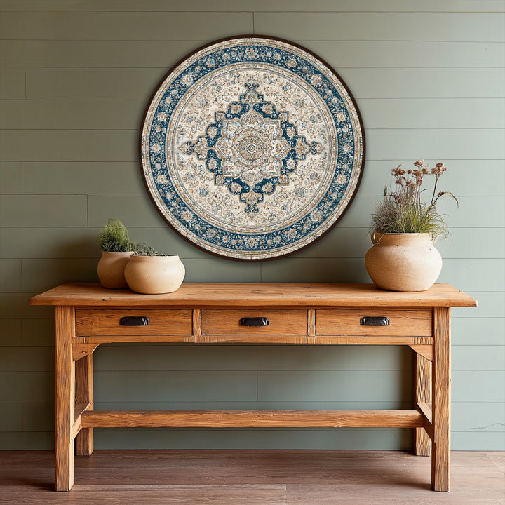 With layers of design, this round Persian-inspired oil painting wall art showcases depth through its ornate mandala pattern in navy and ivory.