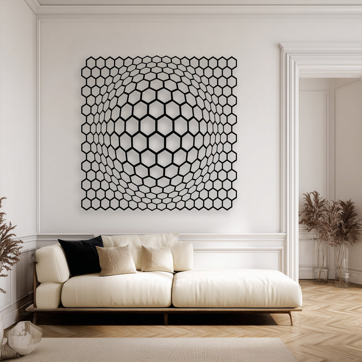 Bold color contrast presented by the black geometric hexagon metal artwork creating a captivating depth illusion on the bright white wall.
