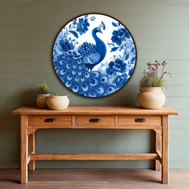 Fluid floral and feathered forms evoke a sense of organic beauty in this round indigo peacock oil painting home decor, featuring exquisite blossoms.