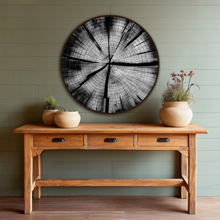 Horizontal, circular oil painting artwork featuring monochrome tree rings on wood, a minimalist and modern design.