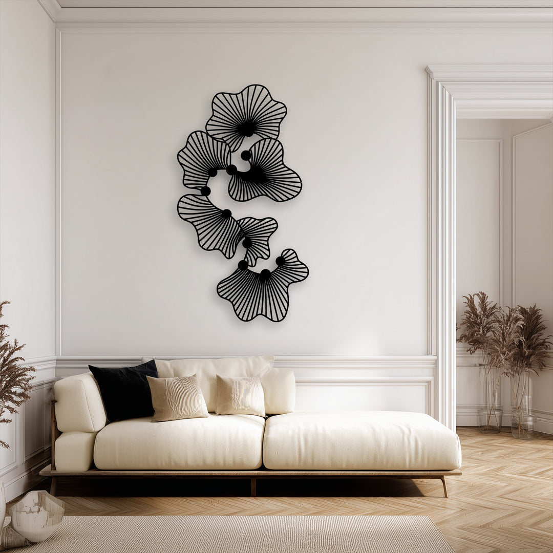 The darkest area showcases intricate black abstract floral metal art for wall, featuring modern line flower designs.