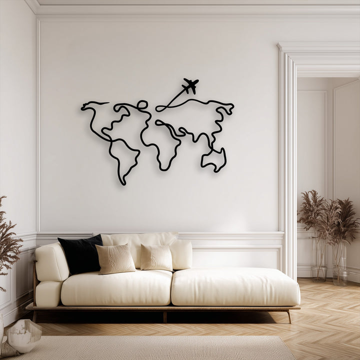 The serene mood of a chic living room is enhanced by the unique metal wall art of a minimalist world map with an airplane.