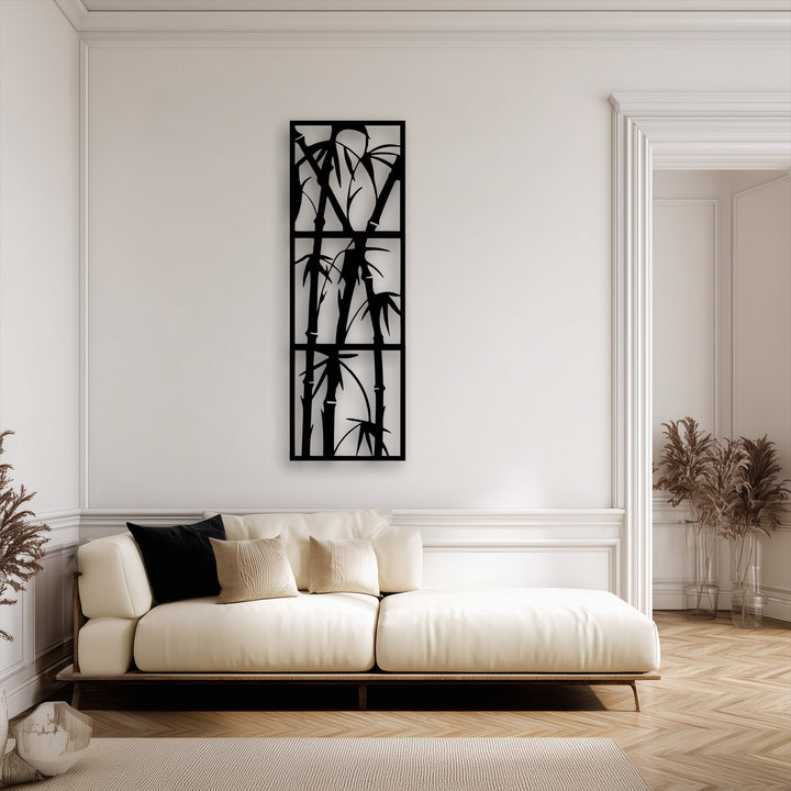 A tall, rectangular decorative metal art piece featuring a minimalist Zen bamboo design, elegantly divided into three panels.