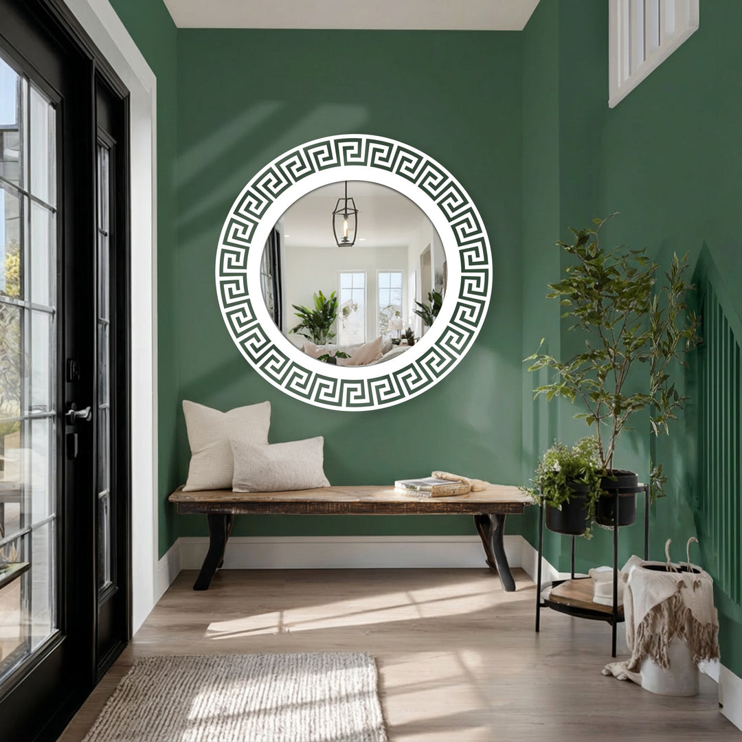 Visual rhythm is created by the repeating Greek key pattern in this round mirror for wall decor, adding a bold geometric statement above the entryway bench.