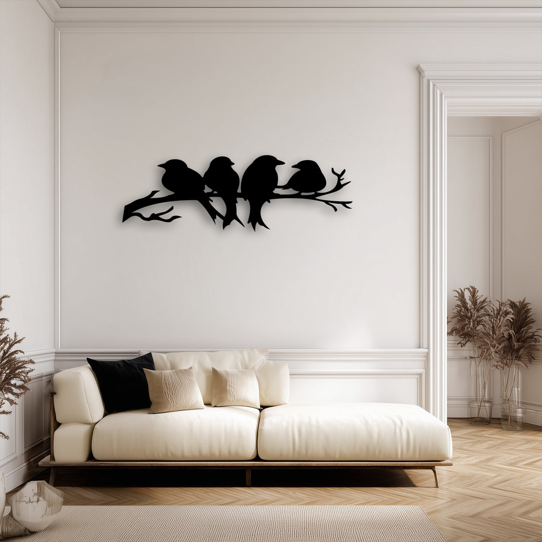 The sharp angles and linear forms of the wall moldings complement the abstract bird silhouettes of the metal wall decor, creating a modern aesthetic.