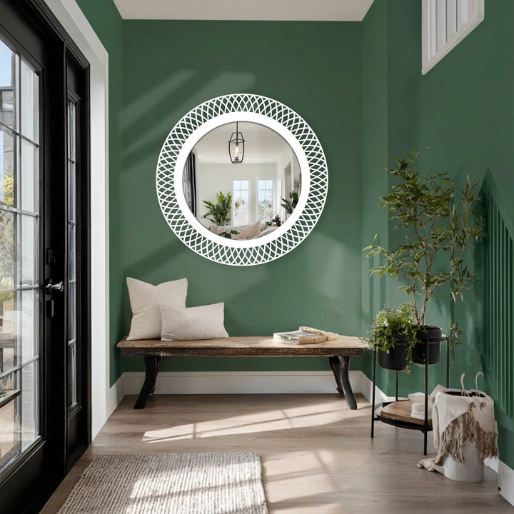 Green wall showcases a geometric lattice round floor modern mirror with a black metal frame, adding depth and style to the space with stunning metal wall decor.