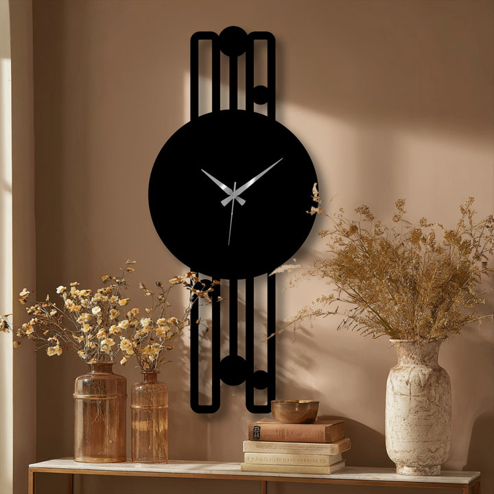 Warm color temperatures highlight the elegant vertical decorative metal art wall clock with a minimalist geometric frame, creating a cozy atmosphere.