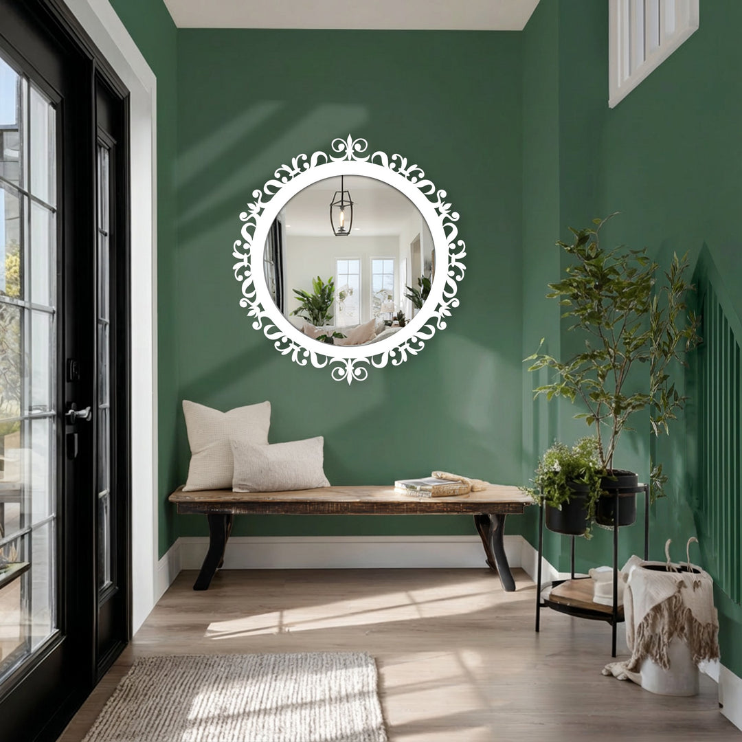 Reflecting the ornate frame in its depths, the round mirror for wall decor adds to the layering effect, enhancing the light and spaciousness of the entryway.