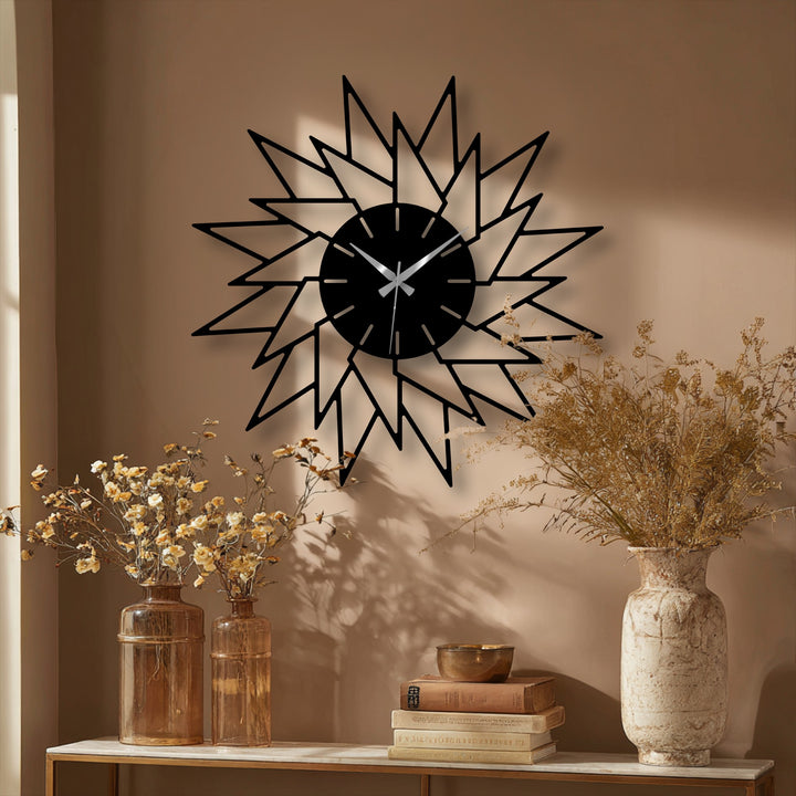 Organic forms of the abstract starburst-shaped decoration wall art metal clock add natural artistry to a contemporary geometric design.