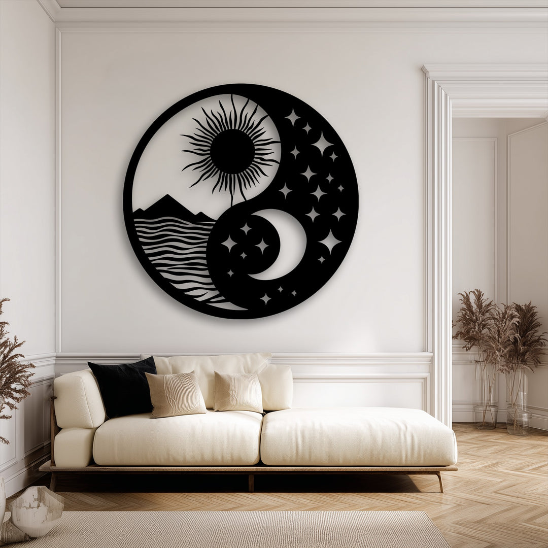 The precisely cut circular outer edge and sharp internal borders of the black metal art for wall beautifully outline the celestial sun moon landscape.