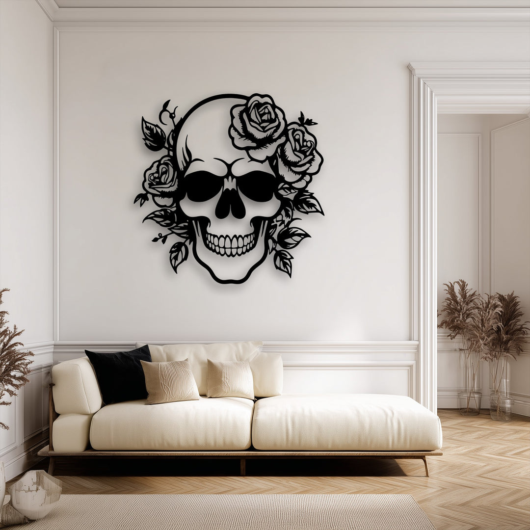 The sleek, matte black finish of the floral skull metal artwork creates a striking gothic rose decor against the white wall.