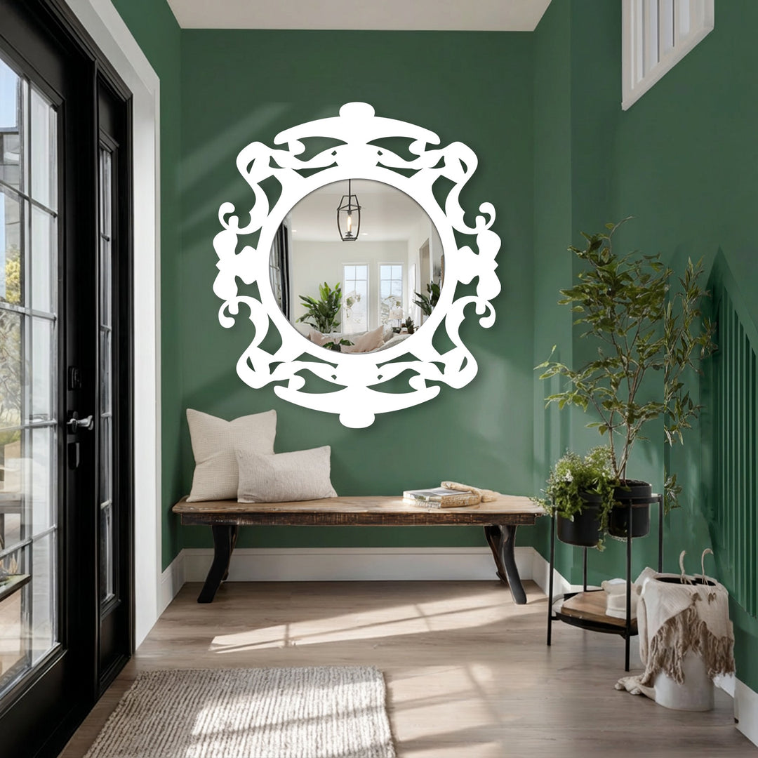 The mirror's finish highlights the ornate decorative mirror frame and the reflected foyer, creating a bright and inviting space.