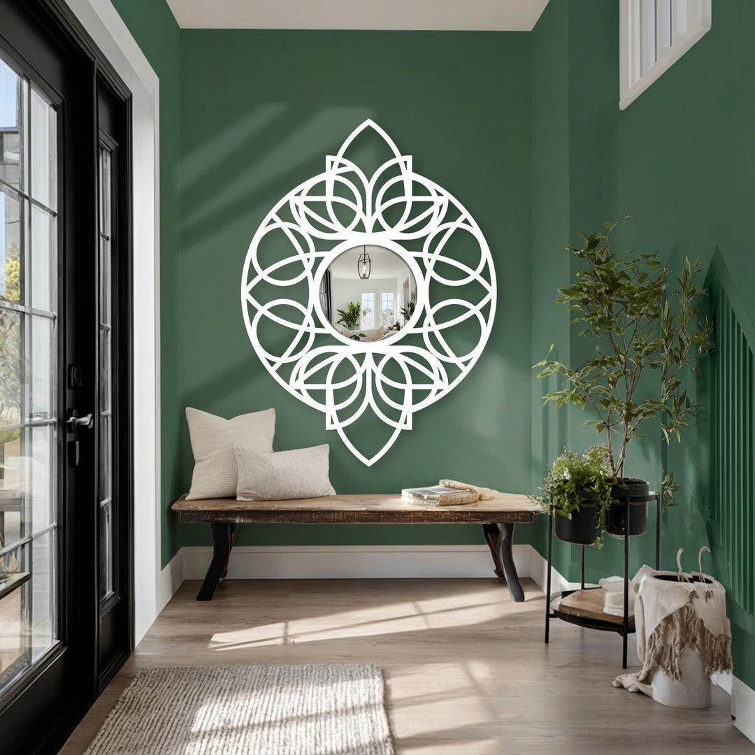 The ornate circular frame is the loudest element in this decorative mirror, bringing an artistic flourish to this bright interior with its round mandala decoration wall art.