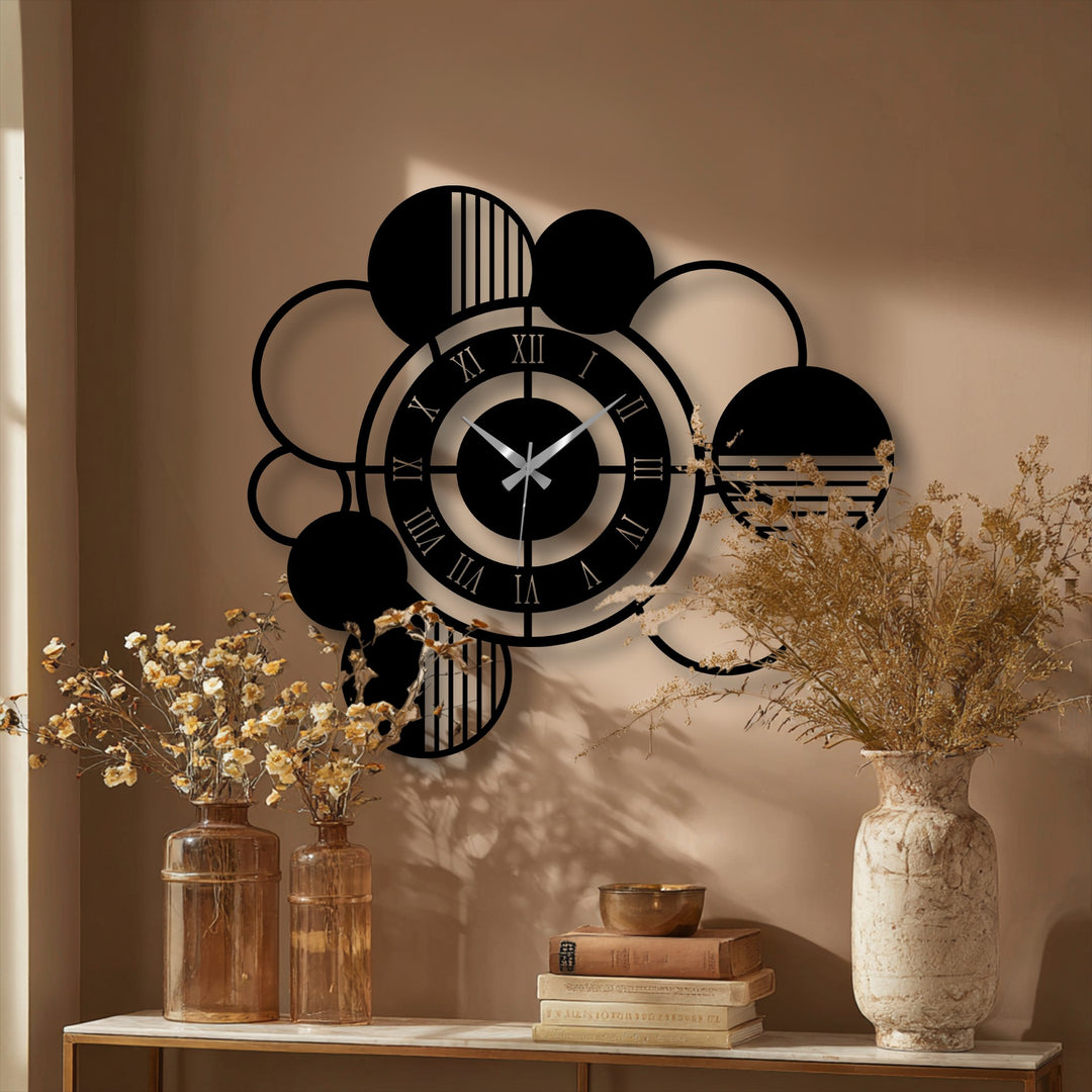 Crafted with durable metal artwork, the modern abstract circle metal wall clock displays its geometric design and crisp Roman numerals in high-quality detail.