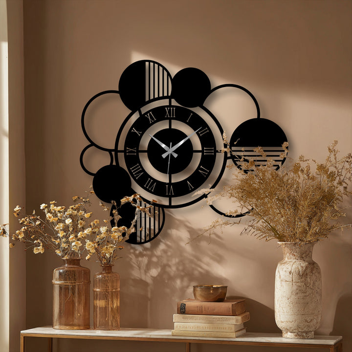 Crafted with durable metal artwork, the modern abstract circle metal wall clock displays its geometric design and crisp Roman numerals in high-quality detail.