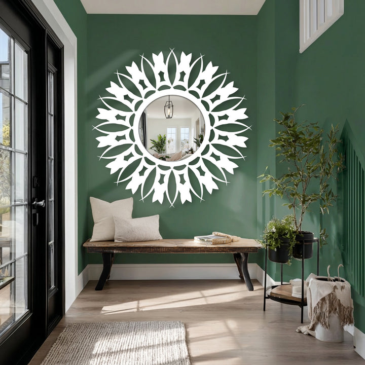 Flowering organic design elements encircle this floral sunburst round floor mirror, suggesting artistic decorating with wall mirrors in a modern hallway.