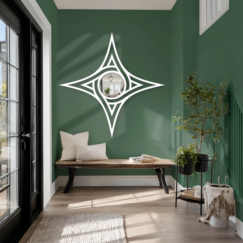 Horizontally oriented star-shaped decorative metal art featuring a central round mirror, embodying modern wall mirrors design.