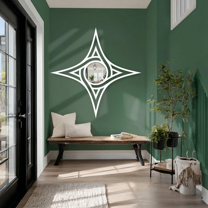 Horizontally oriented star-shaped decorative metal art featuring a central round mirror, embodying modern wall mirrors design.