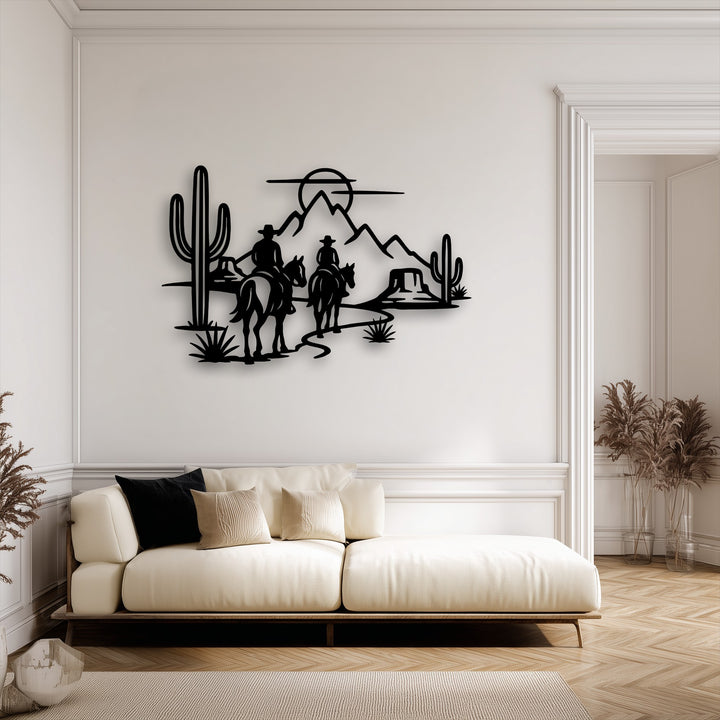 The layering effect gives striking depth to this desert cowboys silhouette metal wall decor, featuring horses and cacti elegantly set against a clean backdrop.