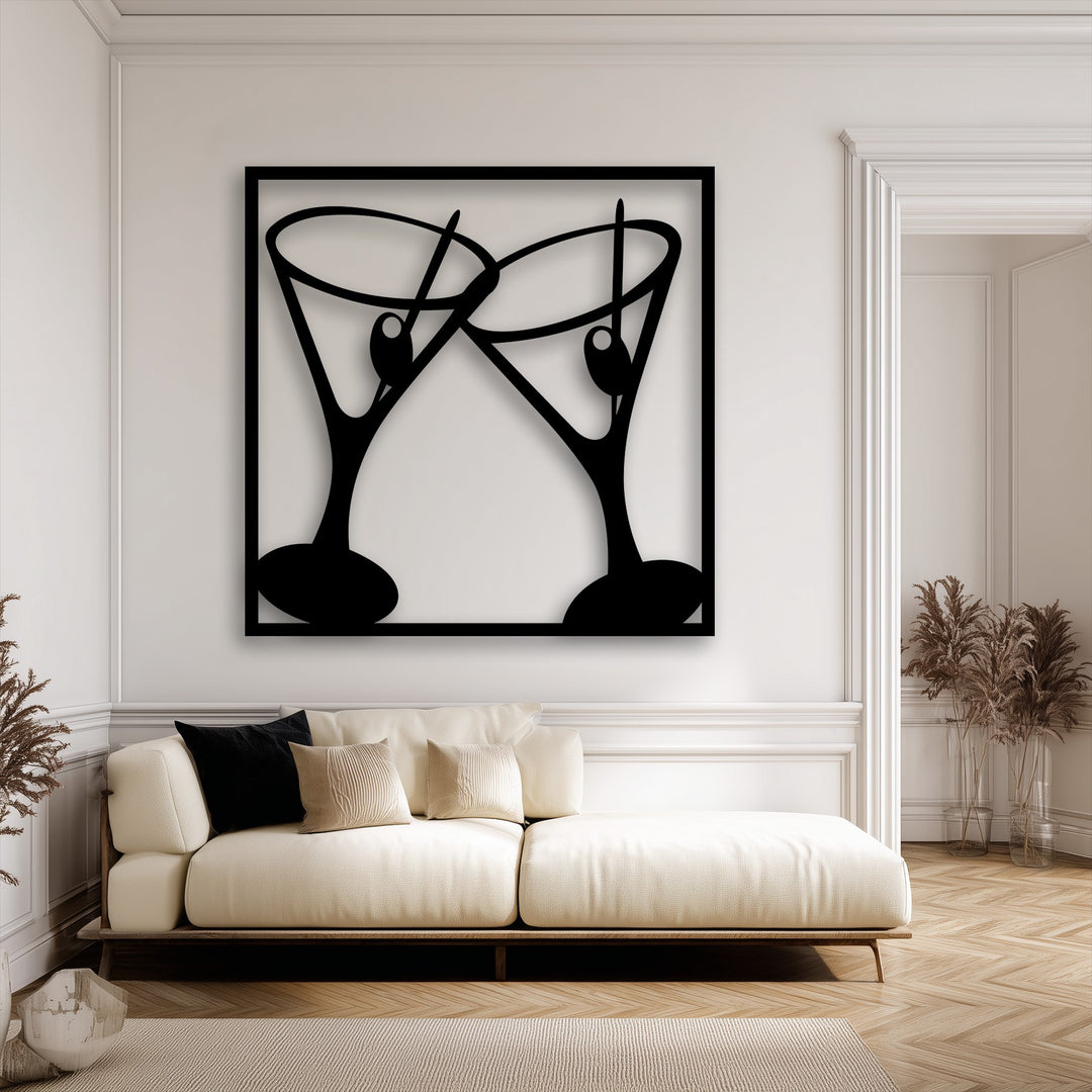 The smooth, flowing lines of two martini cocktail glasses with olives create organic forms in this modern unique metal wall art.