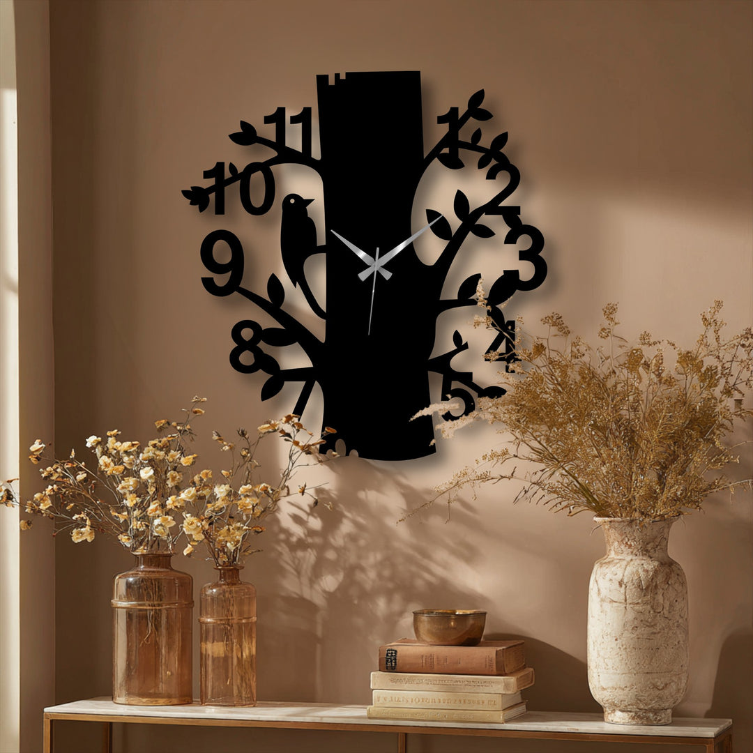 Neutral background complements the black forest bird metal wall clock, creating a unique metal wall art display for nature-inspired decor.