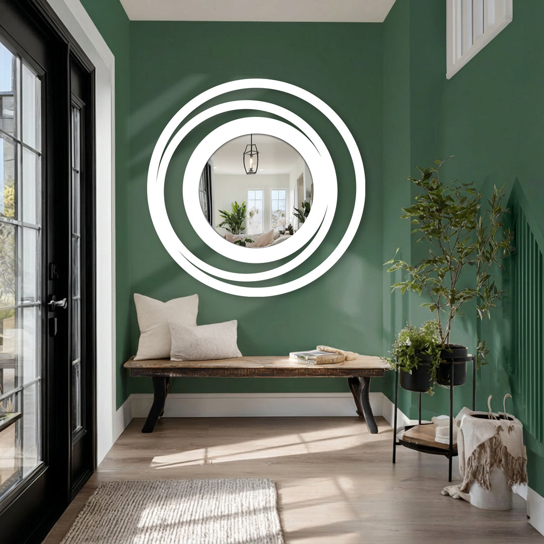Swirling concentric circles of the Orbit Ring Floor Mirror's design create a compelling sense of movement for eye-catching decorative metal art.
