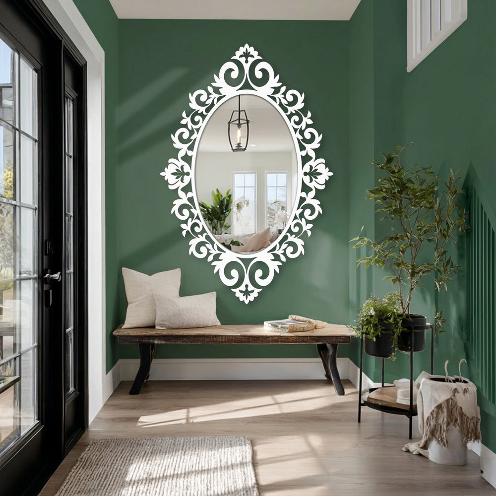 Subtle light and shadow highlight the ornate details of the framed wall mirror, adding depth to the elegant Baroque Elegance Floral Oval Floor Mirror.