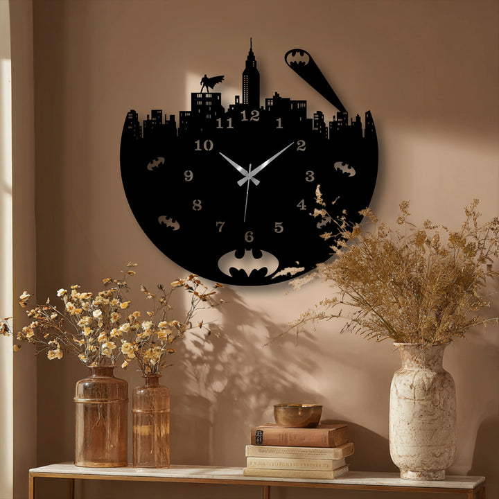 With muted color saturation, a striking metal wall clock depicting an urban night skyline with a Dark City Hero theme stands out as decoration wall art.