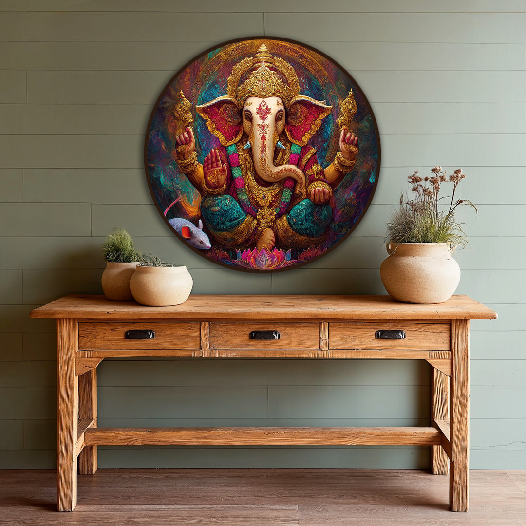 Circular oil painting artwork of Ganesha features concentric rings and radial patterns, embodying home decor and spiritual geometry in gold and jewel tones.