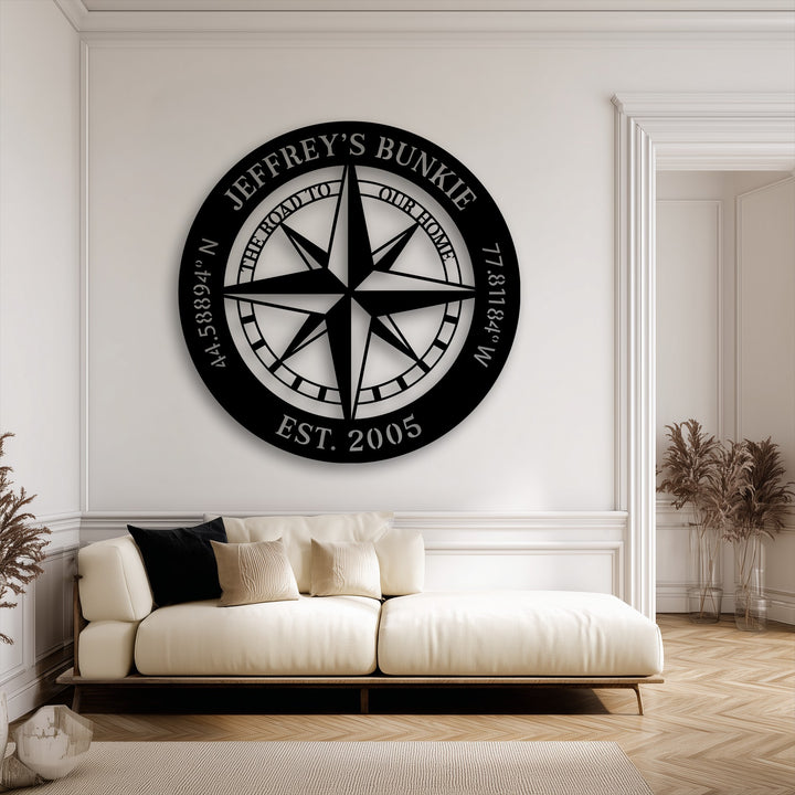 The precision-cut, durable unique metal wall art features a personalized compass design, offering high material quality for nautical decor.
