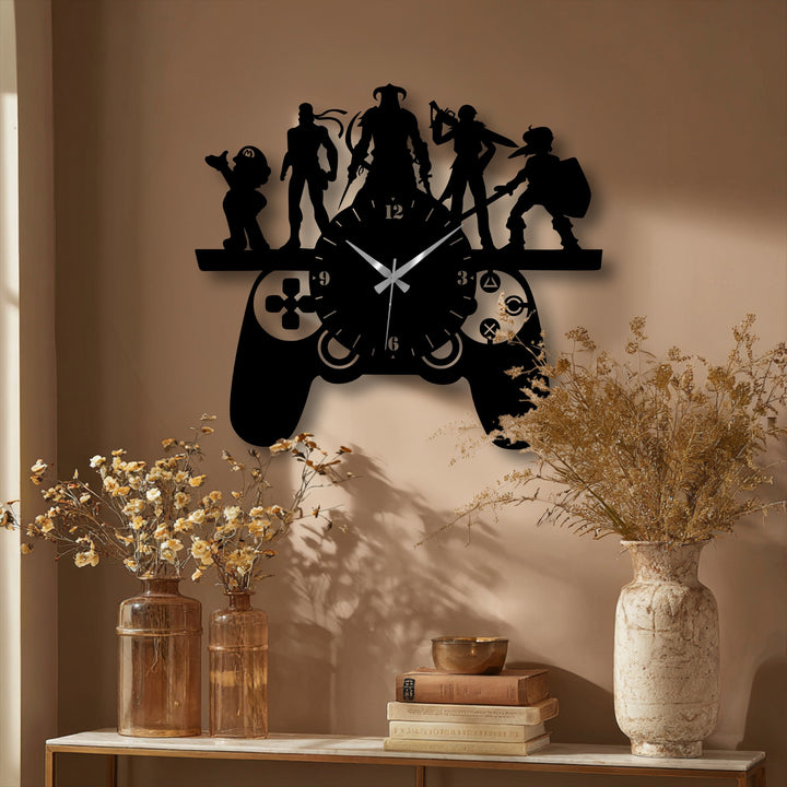 Alternating heights of the character silhouettes create a visual rhythm in this unique metal wall art clock shaped like a gaming controller.