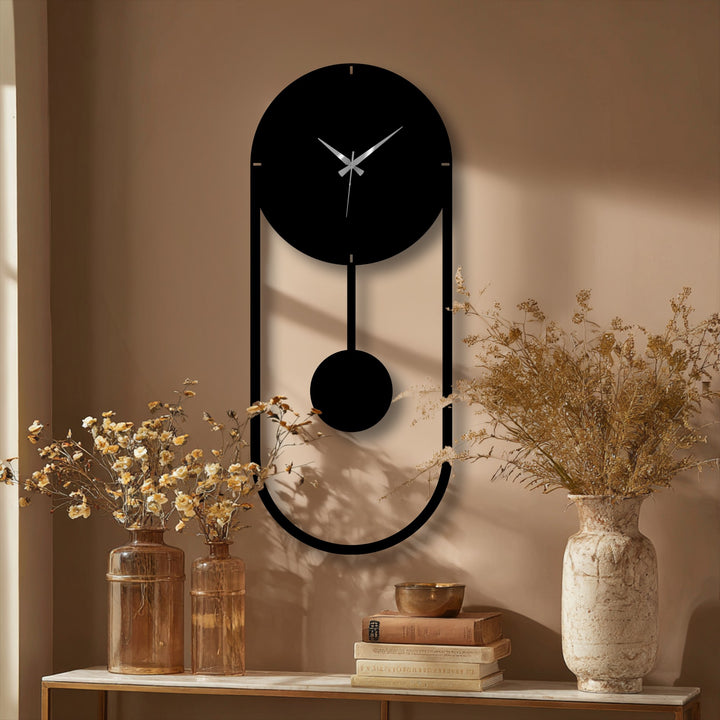 Beige is the dominant color showcasing the minimalist pendulum metal wall clock with a modern vertical frame, creating a unique metal wall art piece.