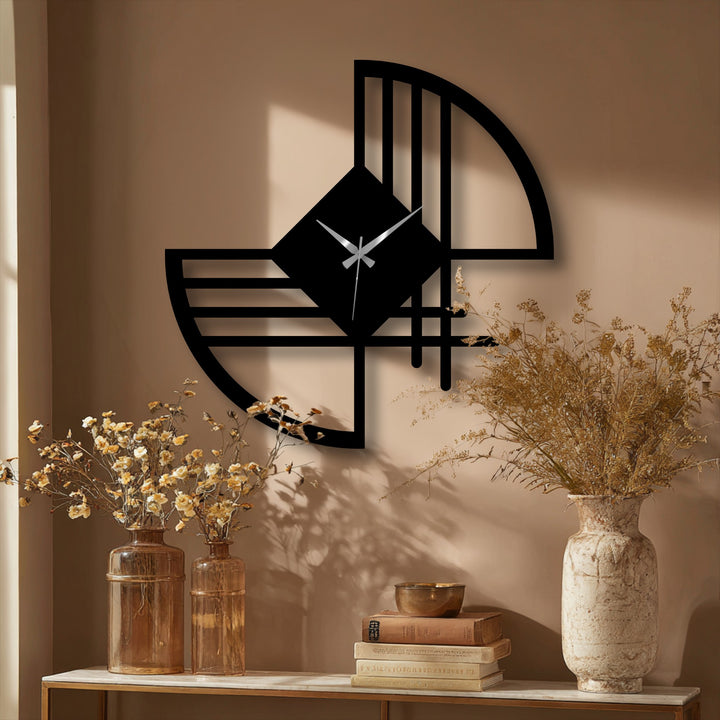 High color contrast accentuates the modern geometric form of the unique metal wall art clock, a bold statement piece against the neutral wall.