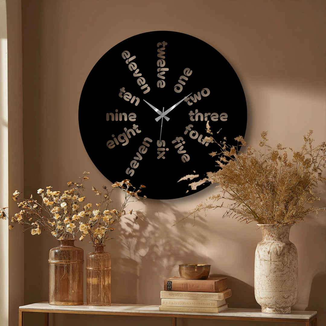 Crafted with exceptional metal wall decor, the Word Time metal wall clock features a durable finish, providing a modern typography design with quality material showcasing word time.