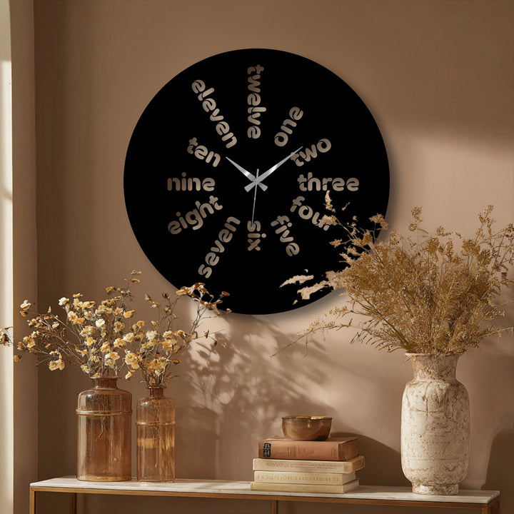 Crafted with exceptional metal wall decor, the Word Time metal wall clock features a durable finish, providing a modern typography design with quality material showcasing word time.