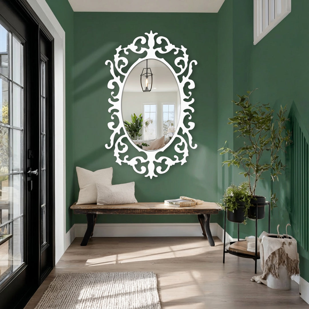 The oval bathroom mirror features geometric curves within its Victorian-inspired frame, adding depth and detail to the reflected hallway scene.