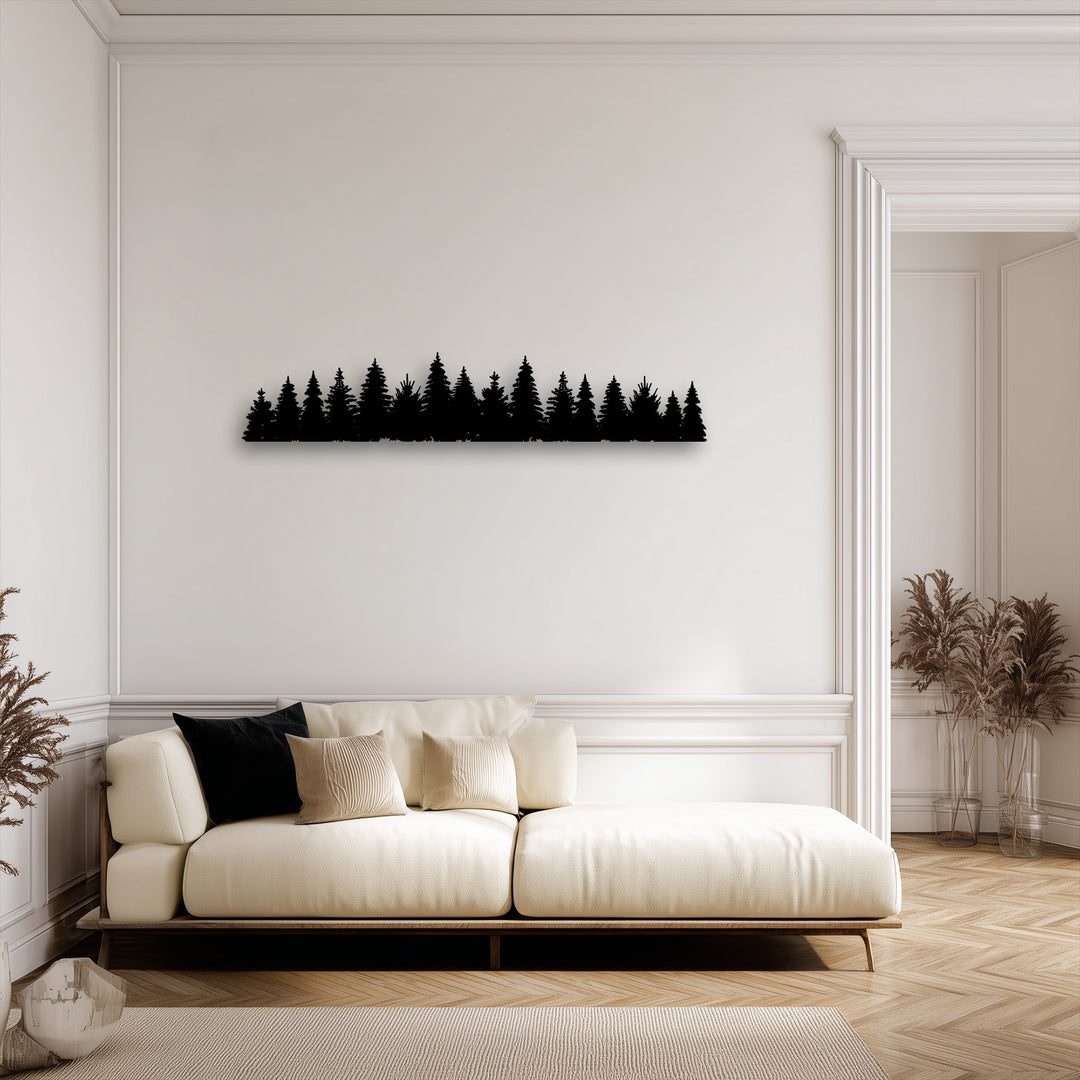 The clean, dark edges of the pine forest silhouette decorative metal art contrast with elegant white wall and door borders.