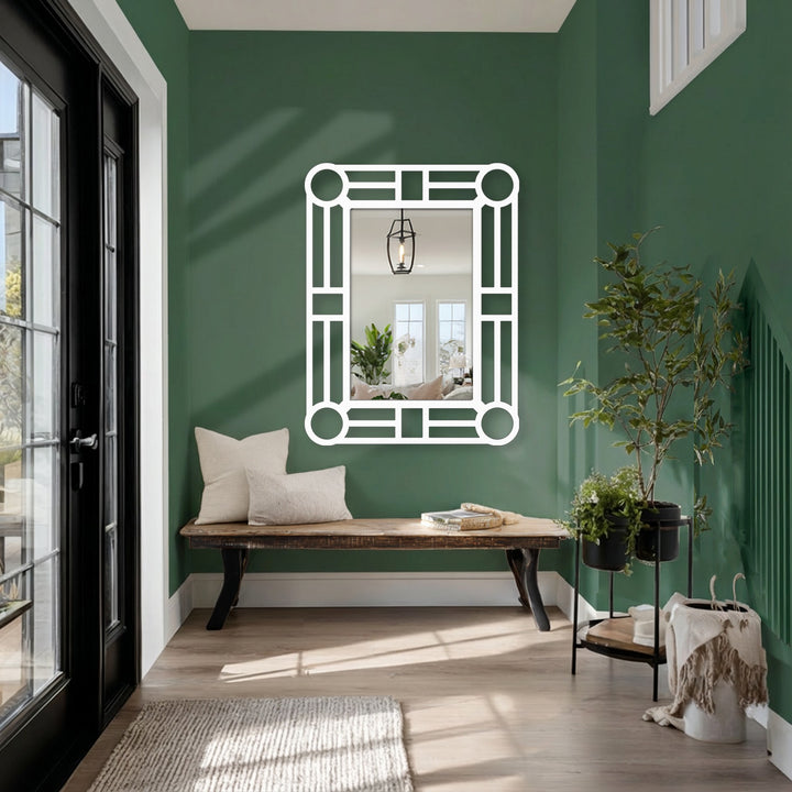 Revealing the subtle surface texture of the geometric metal artwork in this modern wall mirror, showcasing the unique circular accents and reflective qualities.