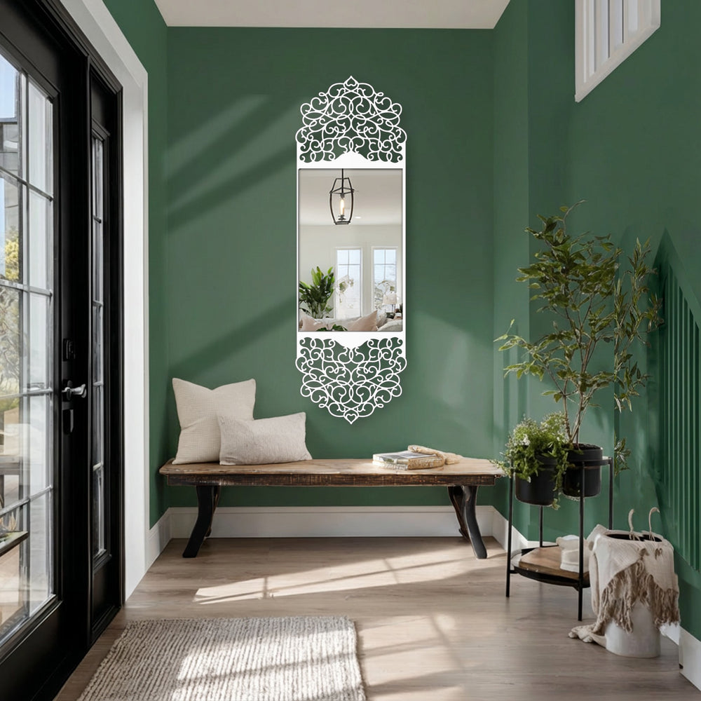 Featuring a smooth black finish on its metal frame, this ornate arabesque arch floor mirror exemplifies modern mirror design with elegant detailing.