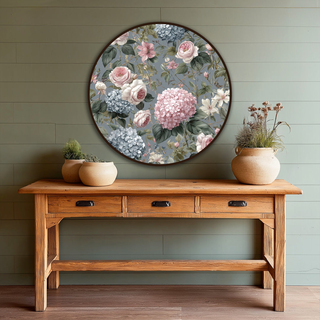 Featuring circular forms, the floral round oil painting art piece presents geometric roses, hydrangeas, and leaves in a vintage garden style.