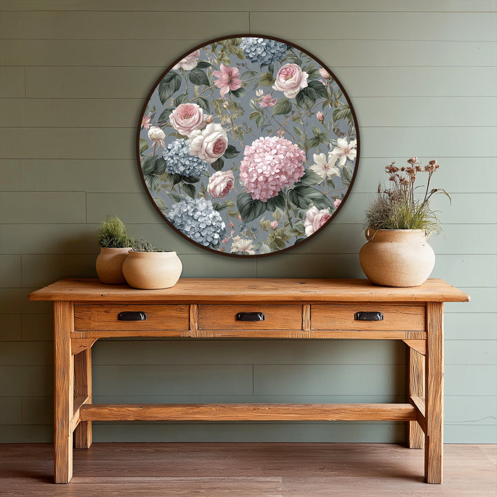 Featuring circular forms, the floral round oil painting art piece presents geometric roses, hydrangeas, and leaves in a vintage garden style.