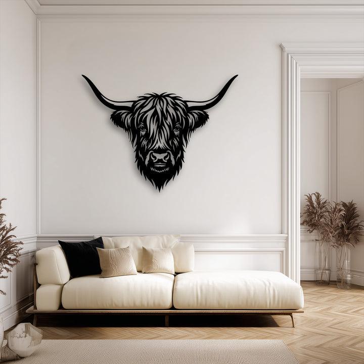 With muted color saturation, this Majestic Highland Bull Head metal wall decor provides a striking black focal point in a serene, neutral room.