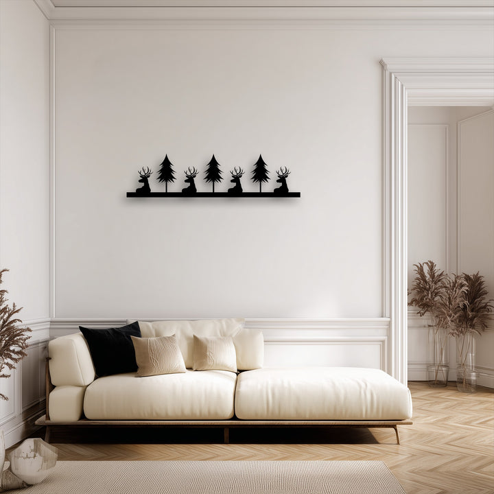 With minimal color saturation, this decorative metal art displays a striking Deer & Pine Forest Silhouette against a light wall.