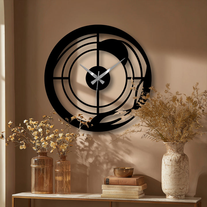 Subtle shading showcases the softest element of the metal decoration wall art, highlighting a modern abstract spiral metal wall clock with elegant hands.